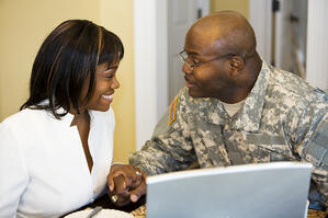 iStock_000005828321Medium_military_couple_at_computer_(2)