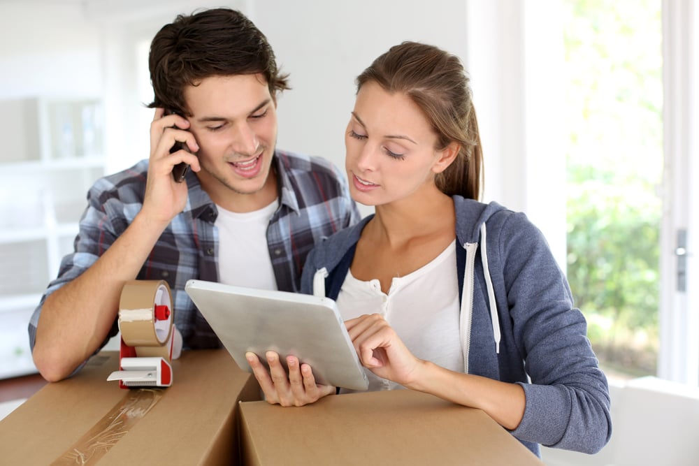 Couple calling transport company to move in new house-1